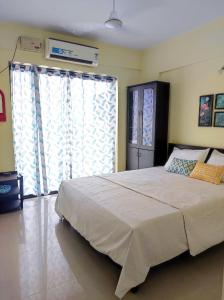 Gulta vai gultas numurā naktsmītnē 1 BHK Flat in Kochi 904