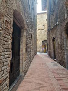 Gambar di galeri bagi Appartamento Sotto le Torri di San Gimignano