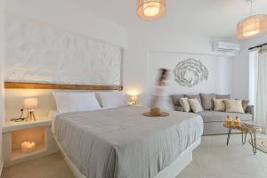 Naxos Finest Hotel & Villas房間的床