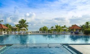 The swimming pool at or close to Isola Di Cocco Ayurvedic Beach Resort