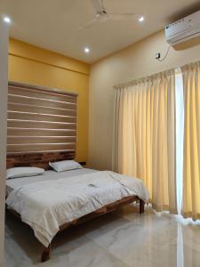 Lova arba lovos apgyvendinimo įstaigoje 2 Bedroom Apartment near Vijayanagar, Bangalore