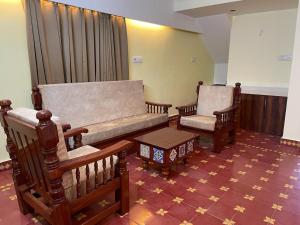 O zonă de relaxare la Viswa Residency Srirangam - Heritage Rooms