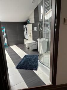 Kamar mandi di Apartament Bobrzańska - 4 bedrooms sypialnie