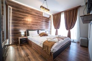 Ένα ή περισσότερα κρεβάτια σε δωμάτιο στο Apartment Tiana Lux 2