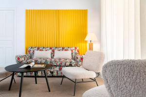 A seating area at Almirante Hoyos House with Private Terrace