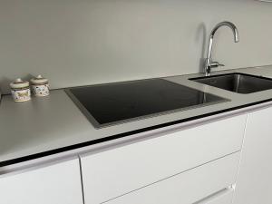 Una cocina o kitchenette en Apartman My Choice