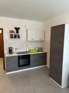 Una cocina o kitchenette en Mani´s Feriendomizil Neuwied