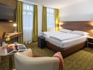 Vuode tai vuoteita majoituspaikassa Hotel Mercure Wien Westbahnhof