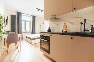 Una cocina o cocineta en Przytulny apartament przy dworcu