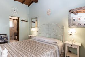 Una cama o camas en una habitación de B&B Al Vecchio Forno