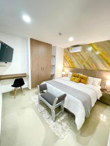 Katil atau katil-katil dalam bilik di Hotel Olam Deluxe Valledupar