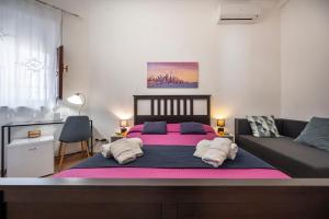 เตียงในห้องที่ Zanzibar - Charming Rooms and Apartments