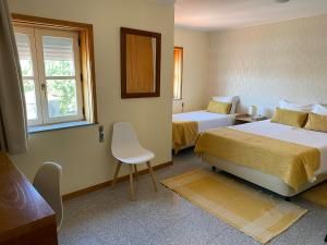 Cama ou camas em um quarto em Enjoy Viana - Guest House