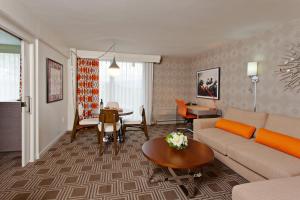 a living room with a couch and a table at The Garland in Los Angeles