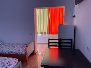 A bed or beds in a room at Vila Muça