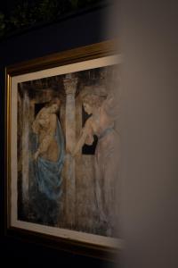 a painting of two women in a building at Nomi Rooms & Restaurant in Bangor