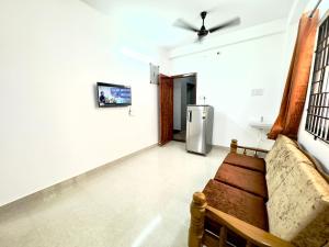 Телевизия и/или развлекателен център в Sishya Service Apartment- 1bhk, IT Expressway, Thoraipakkam, OMR, chennai