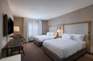 Lova arba lovos apgyvendinimo įstaigoje Fairfield Inn & Suites by Marriott Colorado Springs East