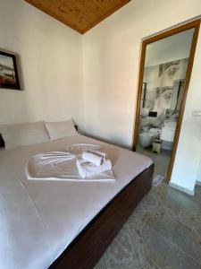 A bed or beds in a room at Vila Elite