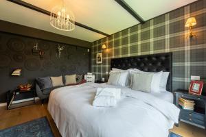 Postelja oz. postelje v sobi nastanitve Bransilvania Fantasy Boutique Chalet - Adults Only