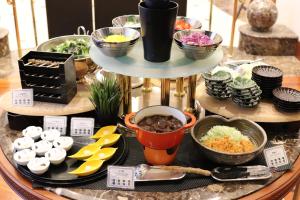 a tray of food on a table with different foods at KOKO HOTEL Nagoya Sakae in Nagoya