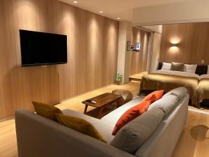 Телевизия и/или развлекателен център в belle lune hotel hakata Suite Room 1