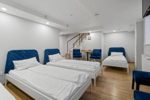 A bed or beds in a room at Stay Express