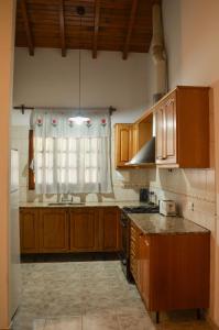 A kitchen or kitchenette at "LA CASONA MARTINEZ" - GH Departamentos