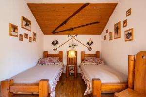 Una cama o camas en una habitación de Fortuna Eco - Boutique Hotel