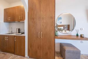 A kitchen or kitchenette at Galatia Studios and Apartments