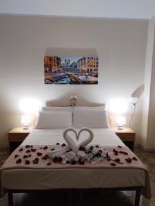 A bed or beds in a room at Palazzo Sant'Antonio