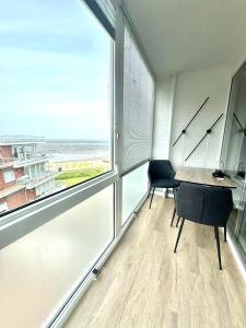 Svalir eða verönd á Traumhafte Ferienwohnung - direkter Meerblick - 50m zum Strand in Cuxhaven Duhnen in 1A Lage im Haus Seehütte