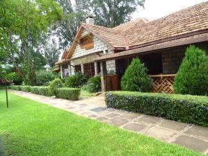 Un jardín fuera de Le Pristine Wellness and Healing Hotel