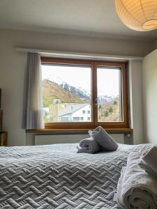 Krevet ili kreveti u jedinici u okviru objekta *TOP* moderne Wohnung im Herzen von Andermatt