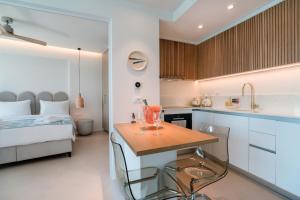 A kitchen or kitchenette at Ocean Rythm Elounda Suite