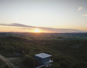 Villa Toscana I - Gran Vista y Tranquilidad في فيلا سيرانا: منظر الغروب من برج المراقبه