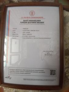 Un certificado, premio, cartel u otro documento en Taşdelen Hotel