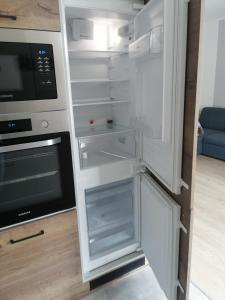 A cozinha ou cozinha compacta de Apartament Zielone Wzgórze