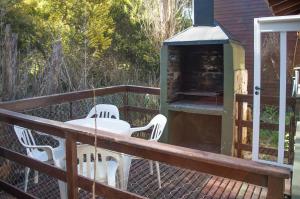 Un balcon sau o terasă la Cabañas Mellmell