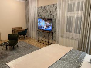 Apartamenty na Starówce - Apartments in the Old Town TV 또는 엔터테인먼트 센터