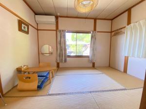 Et opholdsområde på Guesthouse Takayama Hanzansha