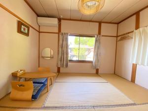 Et opholdsområde på Guesthouse Takayama Hanzansha