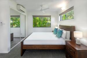 Voodi või voodid majutusasutuse Heliconia Grove - 1 bedroom - on Hamilton Island by HIHA toas