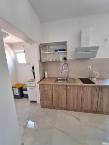 מטבח או מטבחון ב-Apartman Graciela Perfect location Gradac