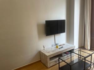 Μια τηλεόραση ή/και κέντρο ψυχαγωγίας στο Apartamento CENTRO con Garaje incluido