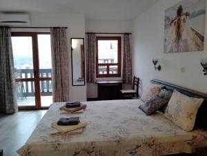 Krevet ili kreveti u jedinici u okviru objekta Pearl Apartments Sozopol