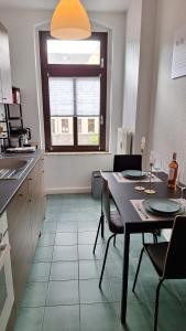 Una cocina o kitchenette en Stylisches Appartement im Jugendstil-Viertel