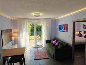 Кът за сядане в Charming apartment with Garden, Free Parking near Basel, Airport, Ger'many, France,