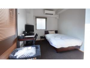 Кровать или кровати в номере 8HOTEL CHIGASAKI - Vacation STAY 87545v