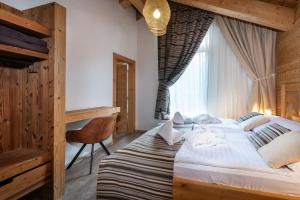 Posteľ alebo postele v izbe v ubytovaní DaSus Lux&Wellness Apartments - Ski In Ski Out - The Best position in Jasna